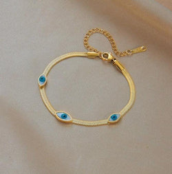 Pulseira Dourada Luxuosa Olhos Azuis- Banhada a Ouro, Semi-Jóias  Pulseira olho grego shopee  Pulseira olho grego bijuteria  Pulseira feminina para mulheres  Pulseira feminina banhada ouro, Pulseira feminina, Pulseira de Olho Grego, Pulseira  Dourada Luxuosa Olhos Azuis, joias Vivara, Joias, Acessórios femininos