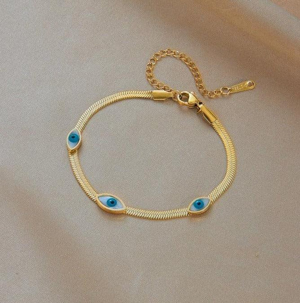 Pulseira Dourada Luxuosa Olhos Azuis- Banhada a Ouro, Semi-Jóias  Pulseira olho grego shopee  Pulseira olho grego bijuteria  Pulseira feminina para mulheres  Pulseira feminina banhada ouro, Pulseira feminina, Pulseira de Olho Grego, Pulseira  Dourada Luxuosa Olhos Azuis, joias Vivara, Joias, Acessórios femininos