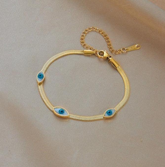 Pulseira Dourada Luxuosa Olhos Azuis- Banhada a Ouro, Semi-Jóias  Pulseira olho grego shopee  Pulseira olho grego bijuteria  Pulseira feminina para mulheres  Pulseira feminina banhada ouro, Pulseira feminina, Pulseira de Olho Grego, Pulseira  Dourada Luxuosa Olhos Azuis, joias Vivara, Joias, Acessórios femininos